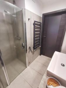Kúpeľňa v ubytovaní Apartament W SERCU USTRONIA