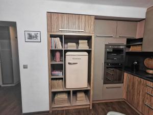 Kuchyňa alebo kuchynka v ubytovaní Apartament W SERCU USTRONIA
