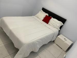 Postel nebo postele na pokoji v ubytování Les Villas Sarah
