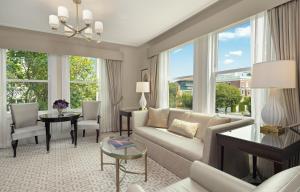 a living room with a couch and a table at Hotel Drisco in San Francisco