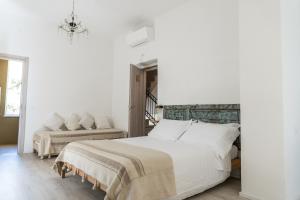 Posteľ alebo postele v izbe v ubytovaní Agriturismo Belvedere 9