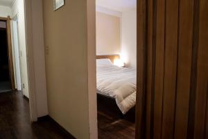 Letto o letti in una camera di Hotel Hermitage