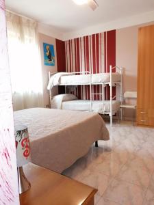 Postel nebo postele na pokoji v ubytování B&B Benevento