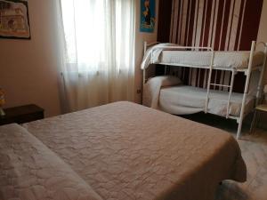 Postel nebo postele na pokoji v ubytování B&B Benevento