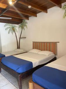 Katil atau katil-katil dalam bilik di Beach Cabinas