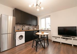 Kuchyň nebo kuchyňský kout v ubytování Stadium apartment + 9 fotografií