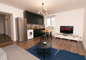 Kuchyň nebo kuchyňský kout v ubytování Stadium apartment