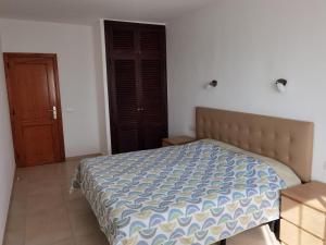Postel nebo postele na pokoji v ubytování Sun Paradise Apartment