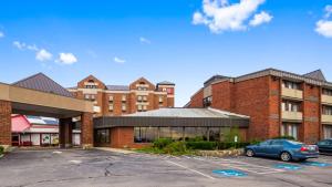 a parking lot in front of a building at Best Western Plus Portsmouth Hotel & Suites in Portsmouth