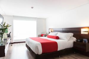 Postel nebo postele na pokoji v ubytování Best Western Plus 93 Park Hotel