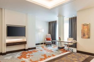 A television and/or entertainment centre at Radisson Blu Hotel, Ajman