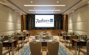 A seating area at Radisson Blu Hotel, Ajman