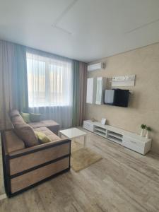 TV a/nebo společenská místnost v ubytování Яровиця. Центр