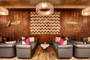A seating area at Radisson Blu Hotel, Ajman