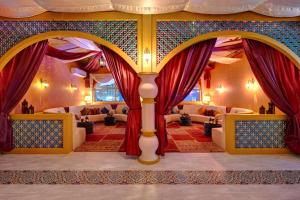 A bed or beds in a room at Radisson Blu Hotel, Ajman