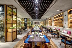 A seating area at Radisson Blu Hotel, Ajman