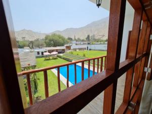 a view from the balcony of a resort at Casa La Parcela en Cieneguilla in Cieneguilla