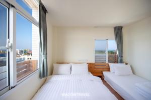 A bed or beds in a room at Mini BnB