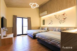 Llit o llits en una habitació de Fun Homestay
