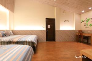 Llit o llits en una habitació de Fun Homestay