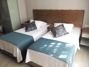 A bed or beds in a room at GALATAHAN Hotel Istanbul Karakoy
