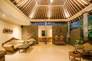Posezení v ubytování La Berceuse Resort and Villa Nusa Dua by Taritiya Collection + 37 fotografií