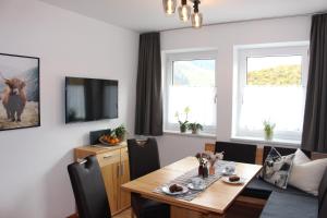 TV a/nebo společenská místnost v ubytování Haus Lorenz