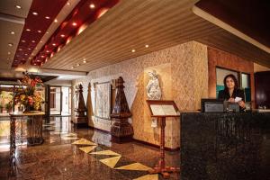 Členové personálu v ubytování Hotel Cervantes