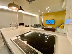 TV in/ali zabaviščno središče v nastanitvi Villa Monica