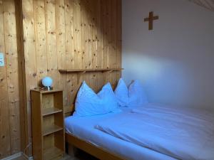 Postel nebo postele na pokoji v ubytování Bauernhof Plachl