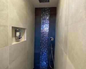 A bathroom at TUSCANY LOFT IN THE CITY