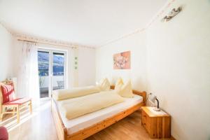 Posteľ alebo postele v izbe v ubytovaní Oberegghof Ferienwohnung Laugen