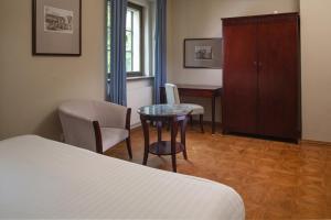Postel nebo postele na pokoji v ubytování Charles Bridge Rooms & Suites by SIVEK HOTELS