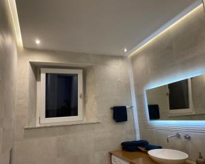 A bathroom at TUSCANY LOFT IN THE CITY