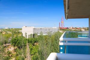 Balkón nebo terasa v ubytování UHC Village Park Apartments