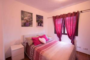 Ein Bett oder Betten in einem Zimmer der Unterkunft Villa Palacios Herrero