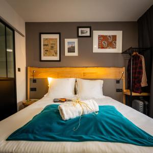 Postel nebo postele na pokoji v ubytování Berti Hotel - Mulhouse Centre Gare