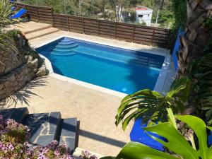 Photo de la galerie de l'établissement Villa Charma with private pool and Air conditioning close to sitges in peaceful location, à Olivella