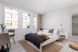 Säng eller sängar i ett rum på Molo Longo - Central Apartments & Rooms