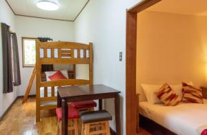 Postel nebo postele na pokoji v ubytování Panketo Lodge & Yoga Studio