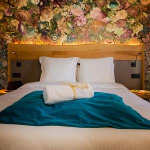 Postel nebo postele na pokoji v ubytování Berti Hotel - Mulhouse Centre Gare