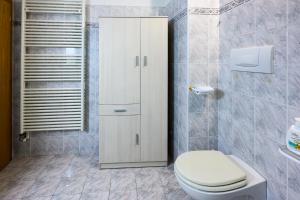 Koupelna v ubytování Casa Maso Clamer
