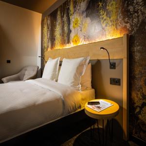 Postel nebo postele na pokoji v ubytování Berti Hotel - Mulhouse Centre Gare
