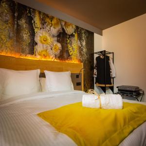 Postel nebo postele na pokoji v ubytování Berti Hotel - Mulhouse Centre Gare