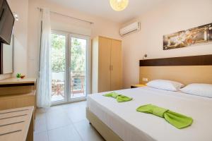 Fotografie z fotogalerie ubytování Apartments Dionysos v destinaci Potos + 37 fotografií