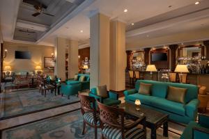 Posezení v ubytování Radisson Blu Plaza Delhi Airport