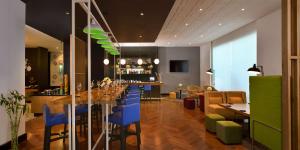 Posezení v ubytování Park Inn by Radisson New Delhi IP Extension