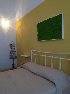Posteľ alebo postele v izbe v ubytovaní 4 Balconi House-Appartamento salentino nel centro di Lecce