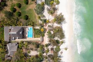 an aerial view of a beach with a pool at Cast Away Residence in Kiwengwa