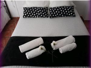 Łóżko lub łóżka w pokoju w obiekcie Cristinas Palace